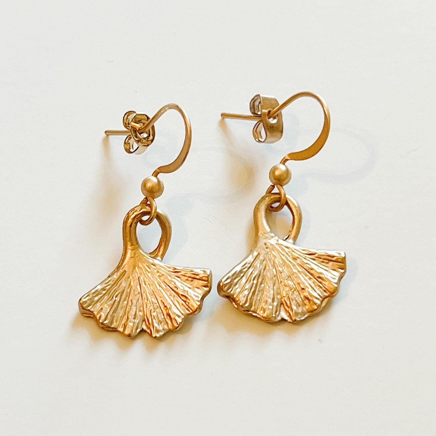 gold fan dangle earrings
