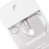 Clear packaging of a touchland product with a dropper on a white background