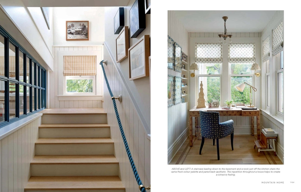 Staircase with a railing and a home office with a desk and chair.