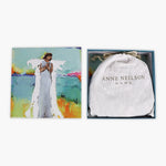 Product packaging with a colorful angel illustration and 'Anne Neilson Home' branding.
