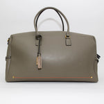 Montemare Roma Duffle in Olive with decorative tassel on a white background
