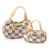 Plush Checker Chewy Vuiton Handbag dog toy in beige and cream check pattern with embroidered “Chewy Vuiton Paris” label and squeaker inside.