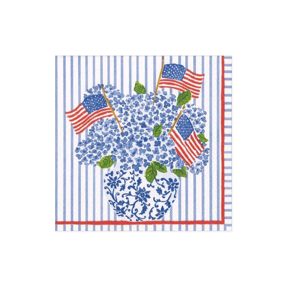 Napkin with blue floral design and American flags on a white background
