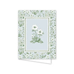 Greeting card with floral design on a light blue background