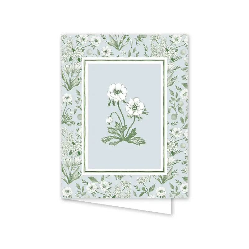 Greeting card with floral design on a light blue background
