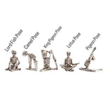 small resin skeletons in yoga positions, five styles