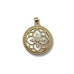 Gold pendant with floral design on a white background
