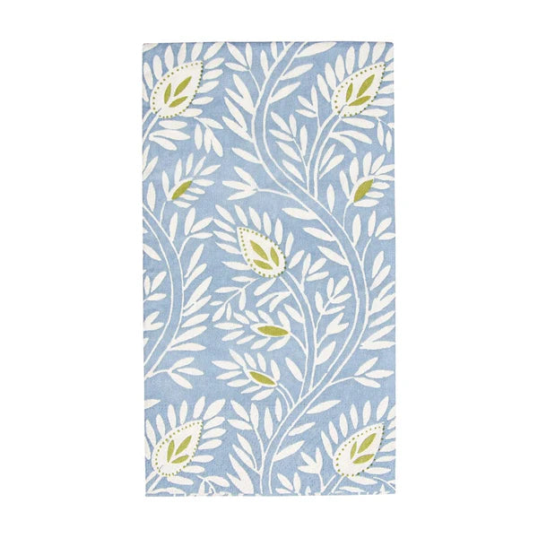 Patterned guest towel with leaf design on a blue background