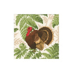Decorative paper napkin with a turkey design on a leafy background