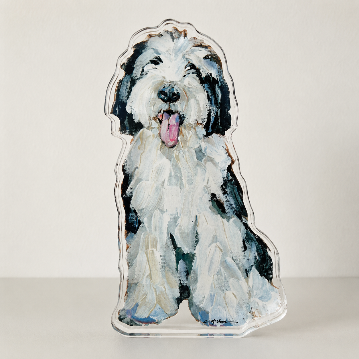 sheepadoodle acrylic figurine on white background
