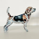 acrylic beagle figurine on a white background