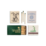 Collection of matchboxes with golf-themed designs on a white background