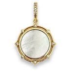 Gold pendant with a central white stone and smaller stones around on a white background