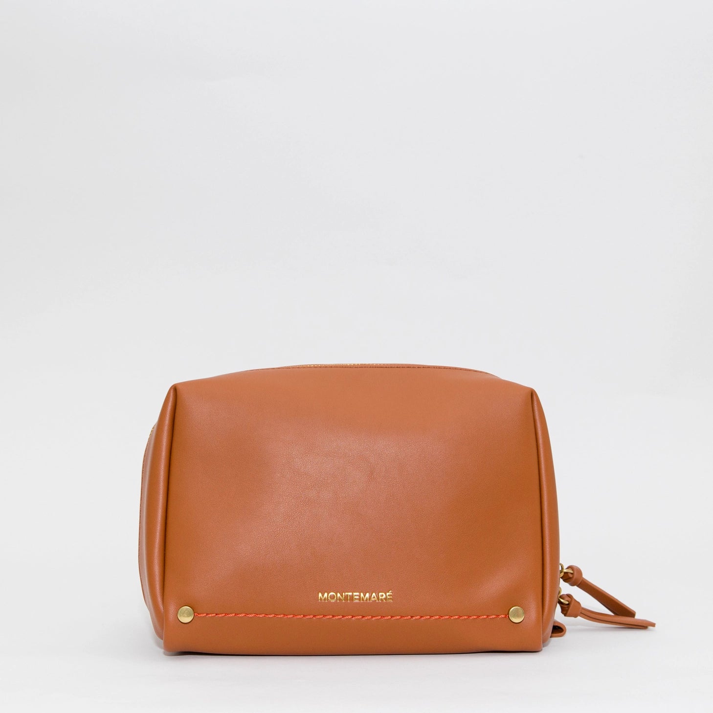 Montemare Roma Standing Toiletry Case in Cognac on light gray background