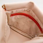 Close-up of a Montemare Roma Square Pouch in Ivory