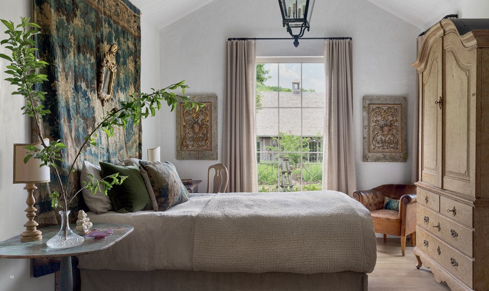 Cozy bedroom with a bed, wardrobe, and decorative elements.