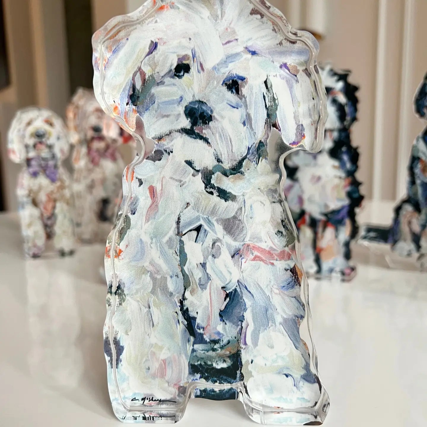 Artistic depiction of a dog in watercolor style with other similar artworks in the background.