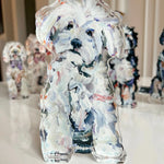 Artistic depiction of a dog in watercolor style with other similar artworks in the background.