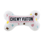 white plush dog toy designed to resemble handbags with 'CHEWY VUITON' embroidered on the surface.
