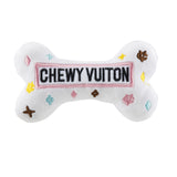 white plush dog toy designed to resemble handbags with 'CHEWY VUITON' embroidered on the surface.