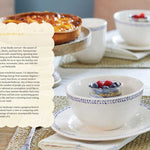 Tea set with a pie and flowers on a table, with text overlay.