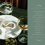 Alcohol menu with cocktail glasses and a drink on a table