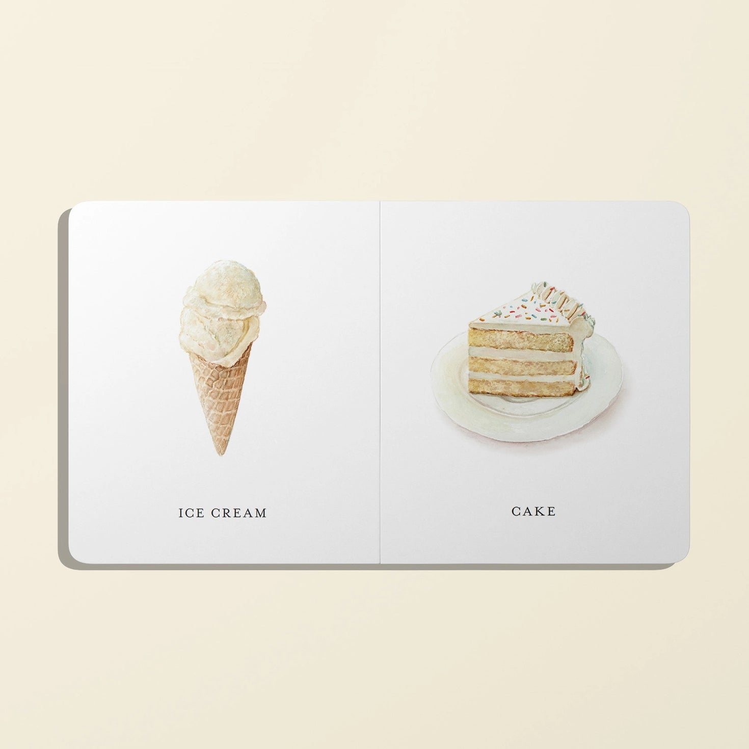 Book with illustrations of ice cream and cake on a beige background