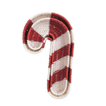 Woven basket like a candy cane with red and white stripes on a white background