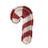 Woven basket like a candy cane with red and white stripes on a white background