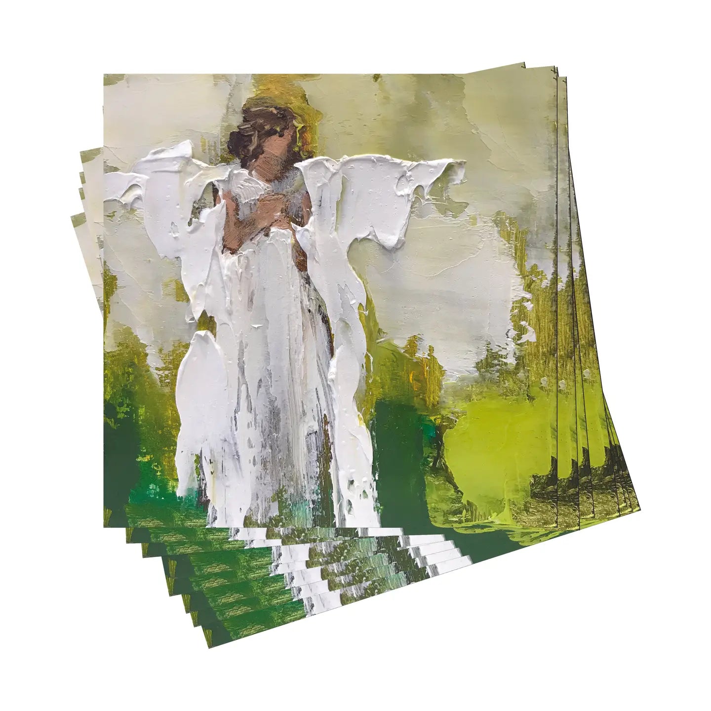 Stack of cocktail napkins with angel design on a white background