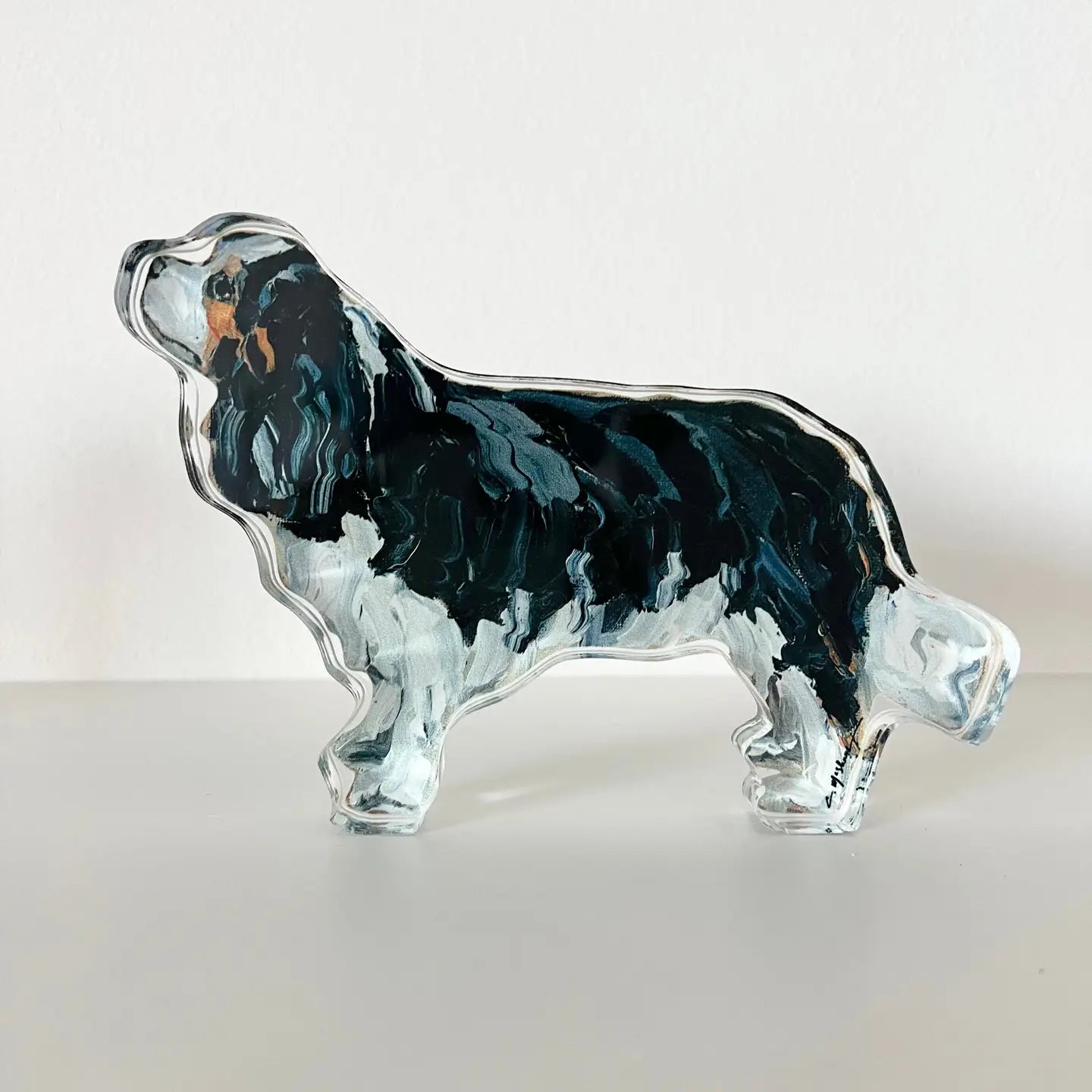 Acrylic Cavalier King Charles dog shelfie featuring painted artwork encased in a thick clear freestanding block.