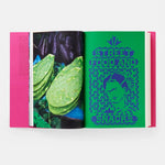 Open book with green pages showing tortilla chips and a colorful cover on a white background