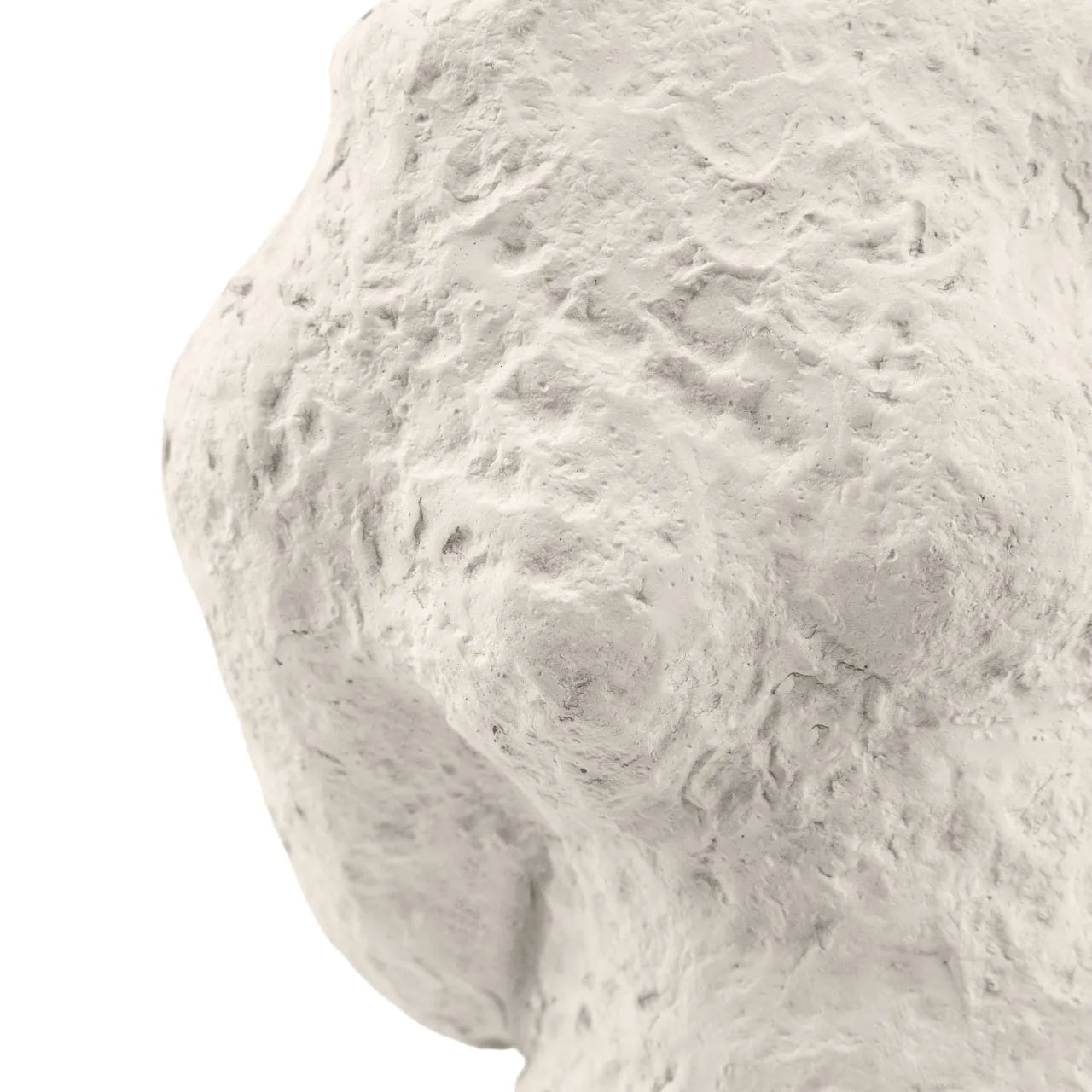 Abstract beige cement figurine sculpture on white background