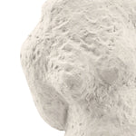 Abstract beige cement figurine sculpture on white background