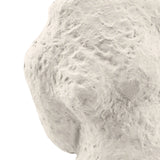 Abstract beige cement figurine sculpture on white background