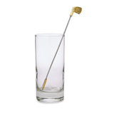 Gold Golf Club Stirrer in glass on white background