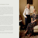 Two women in a living room with text on the left side