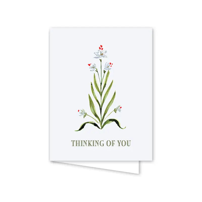 Greeting card with floral design and 'Thinking of You' text on a white background