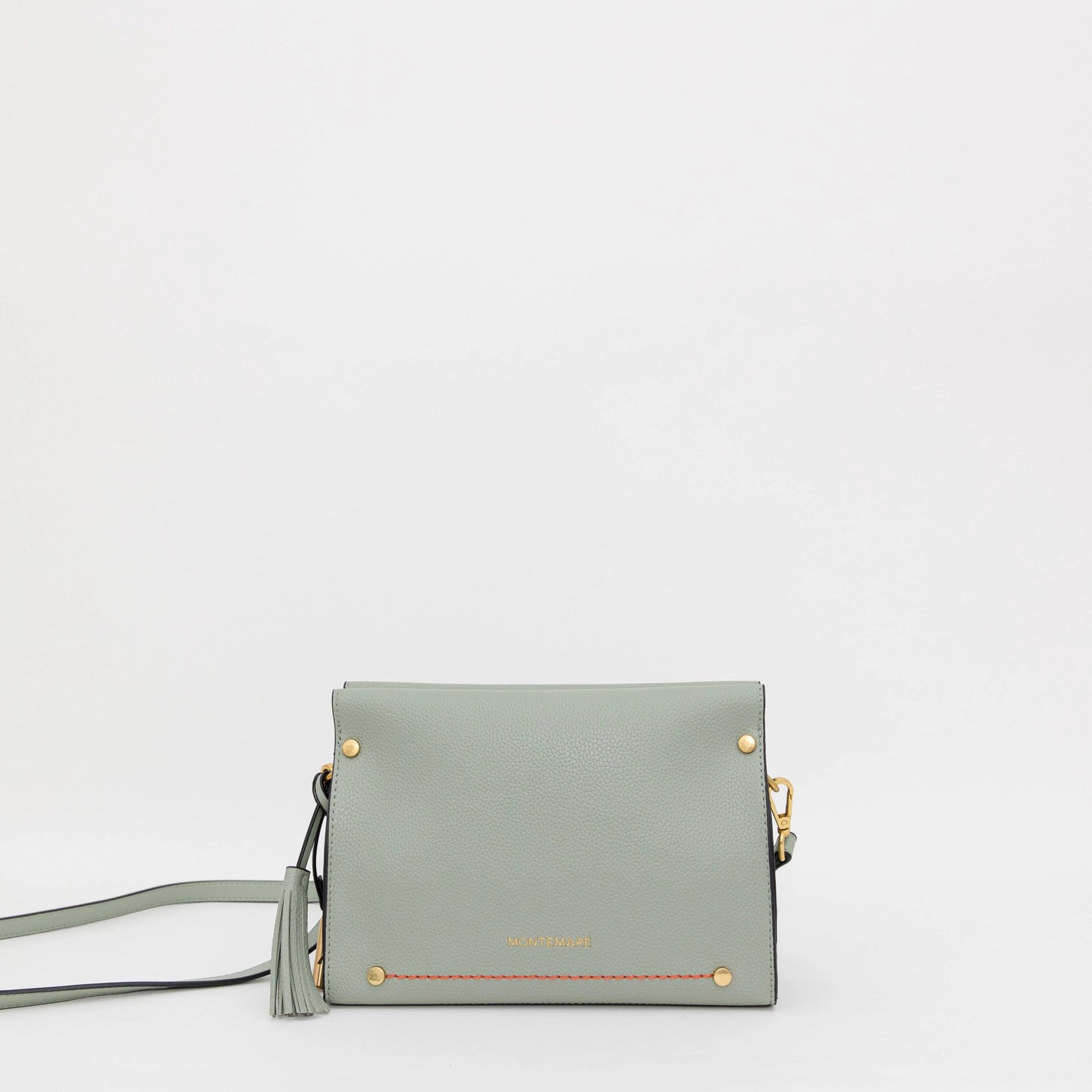 Montemare's Vienna Crossbody in Blakes Blue with gold accents on a white background