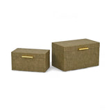 Two gold textured boxes with gold handles on a white background