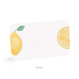 Product packaging with lemon illustrations on a white background