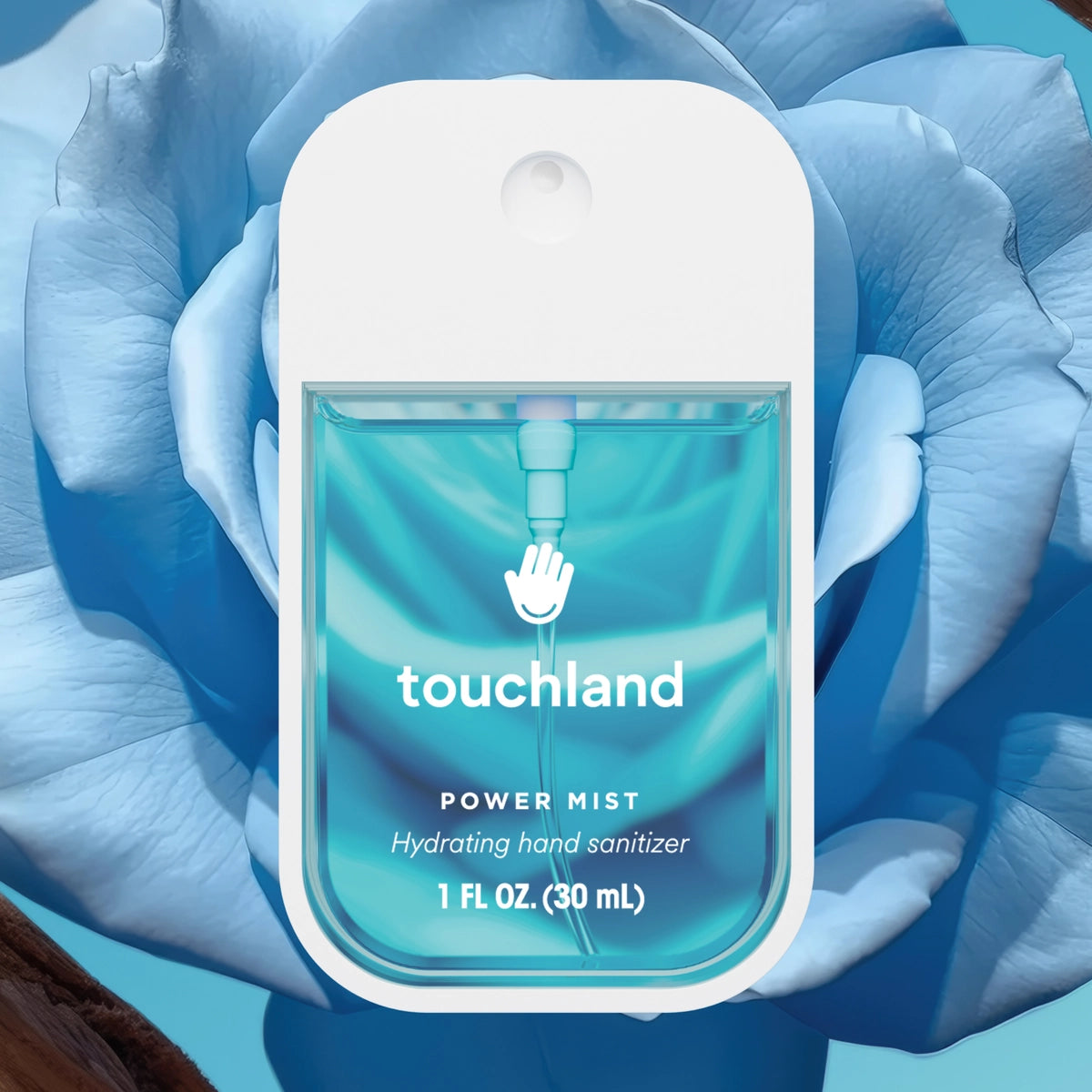 Touchland power mist hand sanitizer packaging with blue floral background