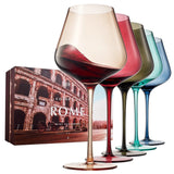 Set of four multicolored wine glasses with a 'Colors of Rome' box.