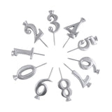 Silver number cake toppers on a white background