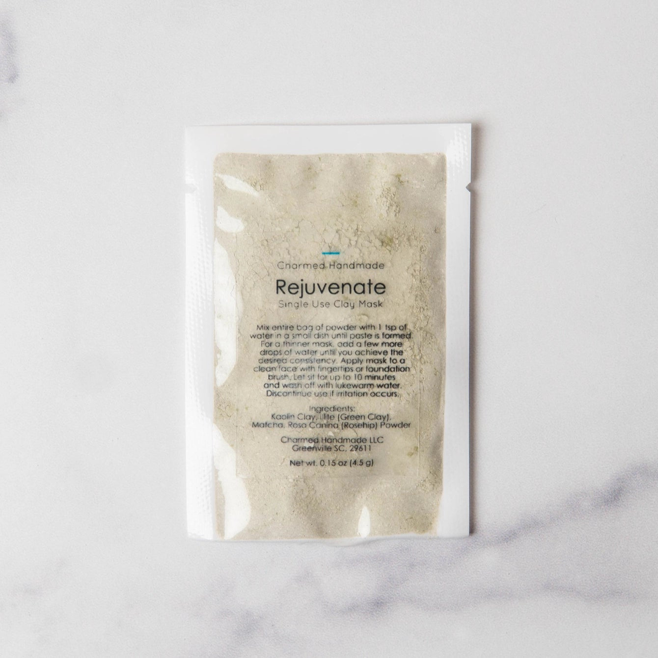 Product packaging labeled 'Rejuvenate' on a marble surface