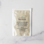 Product packaging labeled 'Rejuvenate' on a marble surface