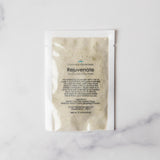 Product packaging labeled 'Rejuvenate' on a marble surface