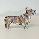 Decorative paper dog sculpture on a white background