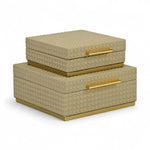 Set of two decorative boxes with beige pattern and gold accents on a white background