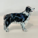 border collie acrylic figurine on white background